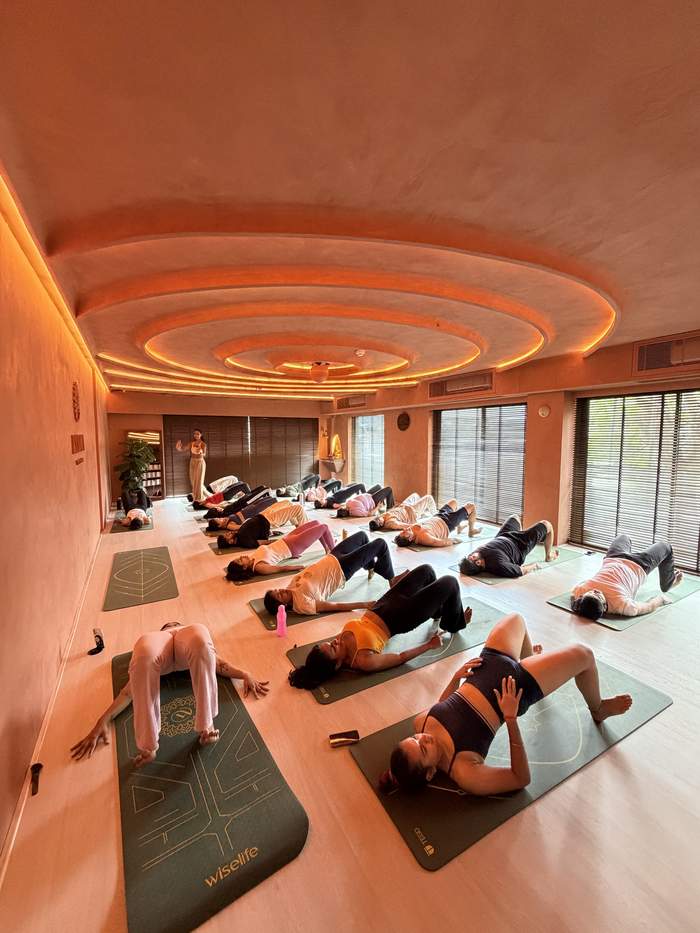 Group resting in savasana